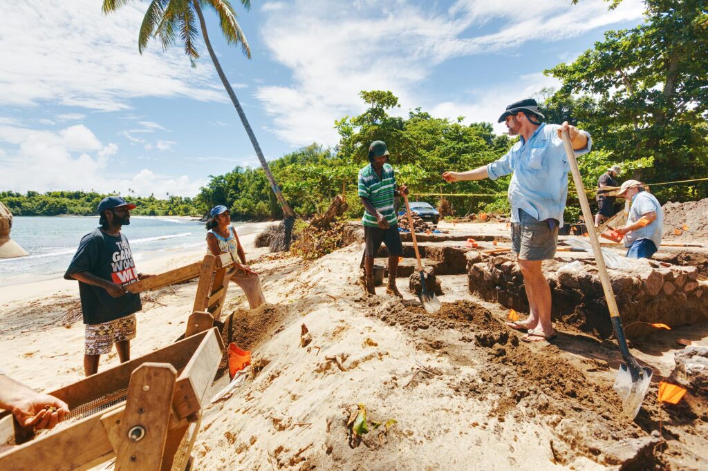 La Soye field sessions were undertaken by overseas academics and local enthusiasts. Here, the team has revealed a stone structure containing ceramic artefacts of Amerindian and European origin. Photo by Paul Crask