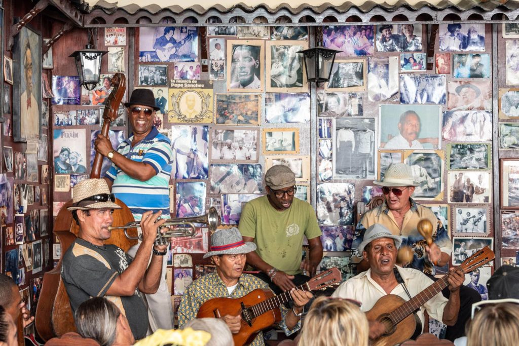 Musicians playing in Casa de la Trova, Santiago de Cuba. Photo by FotosDCuba/Alamy Stock Photo