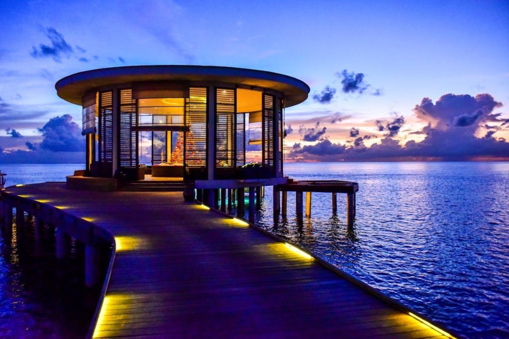 A house on the docks above water.