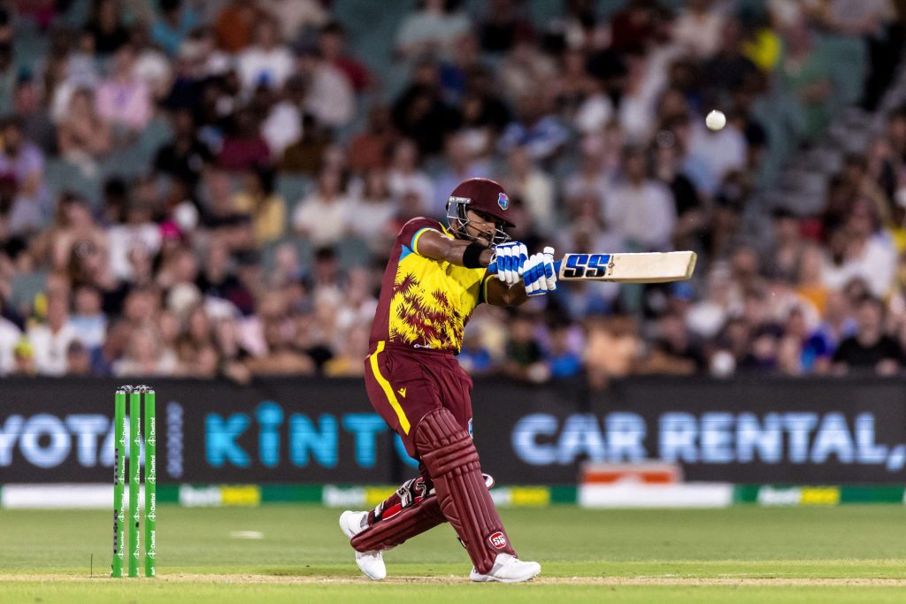 West Indies cricketers Chris Gayle and Shai Hope at the 2016 ICC World Cup. Photo by Action Plus Sports Images/Alamy Stock Photo