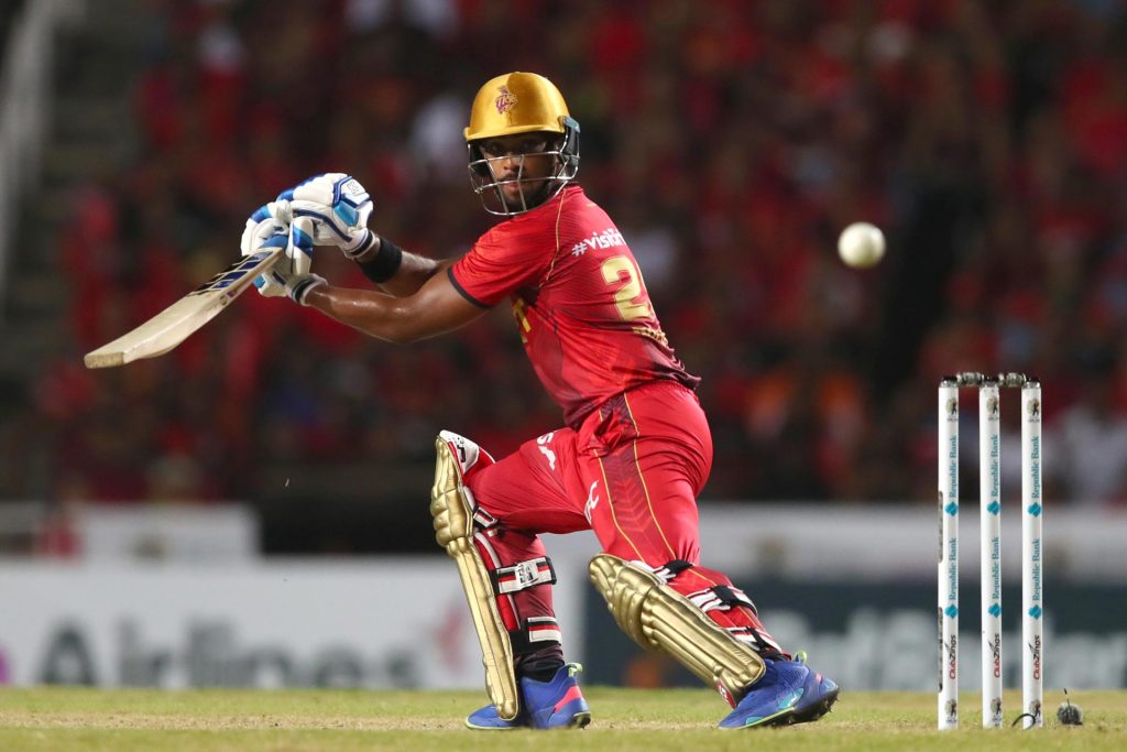 Pooran hits four runs during the Caribbean Premier League T20 match between the Trinbago Knight Riders and Jamaica Tallawahs at the Brian Lara Cricket Academy in Tarouba, Trinidad. Photo courtesy Ashley Allen/CPL via Getty Images