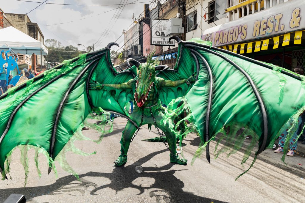 The traditional dragon and Bookman characters appear at The Dragon Festival in downtown Port of Spain on Carnival Friday. Photo by Lisa Fernandez