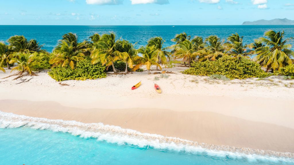 Aerial view of a pristine and uncrowded Carriacou beach. Photo by Hugh Whyte courtesy Unsplash